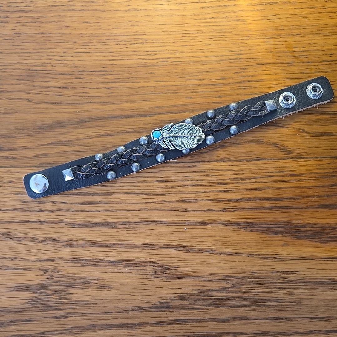 Black Leather Bracelet With Feather Accent 10$